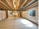 Unfinished basement, ready to customize, with a steel beam and insulated walls at 11650 Lewiston Ct, Commerce City, CO 80022