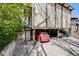 Apartment exterior featuring an underneath parking garage and access to the upper floors via steps at 1349 Race St # 5, Denver, CO 80206