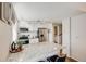 Well-lit kitchen featuring stainless steel appliances and a granite island, perfect for meal preparation and dining at 1349 Race St # 5, Denver, CO 80206