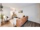 Bright living room showcasing modern decor, sleek wood floors, and comfortable seating arrangement at 1349 Race St # 5, Denver, CO 80206