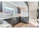 Modern kitchen with granite countertops, stainless steel appliances, and updated cabinets at 2358 Dogwood Cir, Louisville, CO 80027