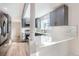 Stylish kitchen featuring granite countertops, stainless steel appliances, and natural light at 2358 Dogwood Cir, Louisville, CO 80027