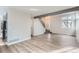 Spacious living room featuring hardwood floors, neutral paint, and staircase at 2358 Dogwood Cir, Louisville, CO 80027