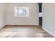 Cozy living space featuring hardwood floors, neutral paint, and natural light, ready for personalization at 2358 Dogwood Cir, Louisville, CO 80027