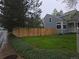 Charming home featuring a fenced-in yard and lush green landscaping for privacy and curb appeal at 2358 Dogwood Cir, Louisville, CO 80027