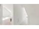 An attic room with white walls and floors covered with protective plastic sheeting at 3901 Alcott St, Denver, CO 80211