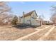 Charming two-story home featuring a ramp, chimney, and inviting facade at 3901 Alcott St, Denver, CO 80211