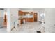 Kitchen with cabinets, tile floors, and natural light from windows at 3901 Alcott St, Denver, CO 80211