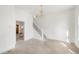 Bright living room featuring a staircase and decorative chandelier at 3901 Alcott St, Denver, CO 80211