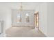 Bright living room featuring an open doorway and decorative chandelier at 3901 Alcott St, Denver, CO 80211