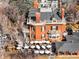 Unique aerial view showcasing the exterior of a classic Victorian home and outdoor dining area at 1313 N Williams St # 301, Denver, CO 80218