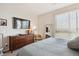Bedroom featuring a large window with natural lighting at 16860 Askins Loop # 102, Parker, CO 80134
