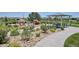 Park with a picnic pavilion and rock sculptures with a beautiful lake in the background at 16860 Askins Loop # 102, Parker, CO 80134