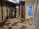 Unfinished basement utility area with exposed pipes and a furnace at 16094 E Exposition Dr, Aurora, CO 80017