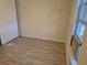 Bedroom with tile flooring, a window with an air conditioner at 16094 E Exposition Dr, Aurora, CO 80017