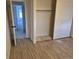 Bedroom with tile flooring and closet at 16094 E Exposition Dr, Aurora, CO 80017