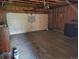 Two car garage with open wooden frame and concrete floor at 16094 E Exposition Dr, Aurora, CO 80017