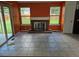 Living space boasts a fireplace and sliding glass doors leading to an outdoor area at 16094 E Exposition Dr, Aurora, CO 80017