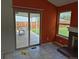 Bright living room with sliding door leading to backyard patio at 16094 E Exposition Dr, Aurora, CO 80017