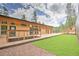 Exterior showcasing a wooden deck and a manicured green lawn at 15175 Rainbow Dr, Sedalia, CO 80135