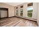Bedroom featuring wood-look floors, neutral paint, recessed lighting and lots of windows at 15175 Rainbow Dr, Sedalia, CO 80135