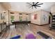 Spacious game room with a pool table, workout equipment, and backyard views at 15175 Rainbow Dr, Sedalia, CO 80135