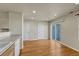 Dining area has hardwood floors, two doors, and sliding glass doors to the outside at 1353 Mallard Ln, Brighton, CO 80601