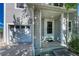 Charming home featuring a one-car garage and inviting front entry with a covered porch at 1353 Mallard Ln, Brighton, CO 80601