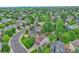 A peaceful neighborhood featuring tree-lined streets and beautifully maintained homes and gardens at 5532 S Valdai Way, Aurora, CO 80015