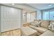 Comfortable living room with plush seating, closet, and natural light at 5532 S Valdai Way, Aurora, CO 80015