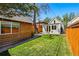 Spacious backyard with a well-maintained lawn and shed at 1612 S Logan St, Denver, CO 80210