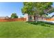 Beautiful home featuring a spacious lawn and a charming exterior with a three car garage at 12814 Forest Cir, Thornton, CO 80241