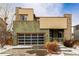 Modern two-story house with a neutral color palette and attached garage at 10081 Truckee St, Commerce City, CO 80022