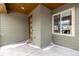 Inviting front entry with a modern door and side window at 10081 Truckee St, Commerce City, CO 80022