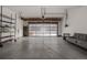 Attached garage with storage shelving and ample space at 10081 Truckee St, Commerce City, CO 80022