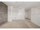 Upper level hallway with neutral carpeting and doors to bedrooms at 10081 Truckee St, Commerce City, CO 80022