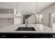 Modern kitchen features stainless steel appliances and ample counter space at 10081 Truckee St, Commerce City, CO 80022