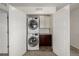 Convenient laundry room with stackable washer and dryer at 10081 Truckee St, Commerce City, CO 80022