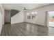 Spacious living room with hardwood floors and lots of natural light at 10081 Truckee St, Commerce City, CO 80022