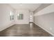 Bright and spacious living room with hardwood floors at 10081 Truckee St, Commerce City, CO 80022