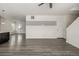 Open living area with hardwood floors and neutral walls at 10081 Truckee St, Commerce City, CO 80022