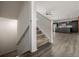 Modern staircase leading to the upper level of the home at 10081 Truckee St, Commerce City, CO 80022