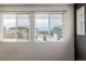Bedroom view of neighborhood homes and distant mountains at 10081 Truckee St, Commerce City, CO 80022