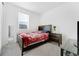Guest bedroom with a comfortable bed, ample natural light, and a clean, simple design at 18953 E 97Th Ave, Commerce City, CO 80022