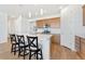 Modern kitchen with a large center island and breakfast bar seating perfect for casual dining at 18953 E 97Th Ave, Commerce City, CO 80022