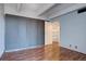 This bedroom features sliding closet doors and a doorway into a walk-in closet with shelving at 777 Washington N St # 802, Denver, CO 80203