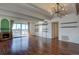 Bright living room with hardwood floors, fireplace, balcony, and skyline view at 777 N Washington St # 802, Denver, CO 80203