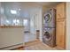 Convenient laundry area with wood cabinets and a view to the patio at 1825 W 32Nd Ave, Denver, CO 80211