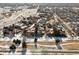 Aerial view of houses in a suburban neighborhood covered in snow, showcasing the layout and community feel at 9140 E 29Th Ave, Denver, CO 80238