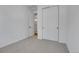 Bedroom view features white walls and light gray carpet at 4040 Eaton Park St, Aurora, CO 80019